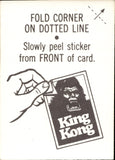 1976 King Kong Topps KONG PUTS THE TERRIFIED DWAN DOWN STICKER #11A