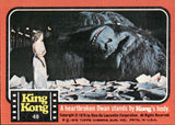 1976 A Heartbroken Dwan Stands By Kong's Body Topps King Kong #48