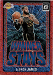 2024-25 LeBron James Panini Donruss Optic WINNER STAYS RED SHIMMER PRIZM 74/75 #1 Los Angeles Lakers