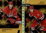 2021-22 Sebastian Aho Seth Jarvis Upper Deck Synergy SYNERGISTIC DUOS STARS AND ROOKIES GOLD 32/99 #SD12 Carolina Hurricanes